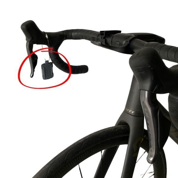 Kini Wireless motion sensor tethered to bicycle